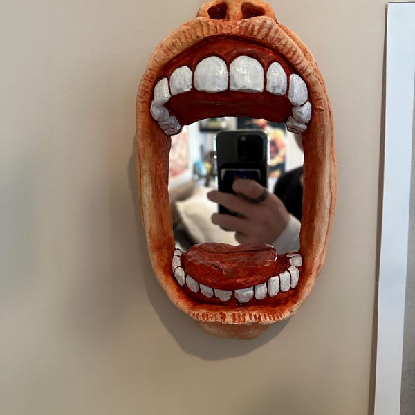Mirror opens mouth