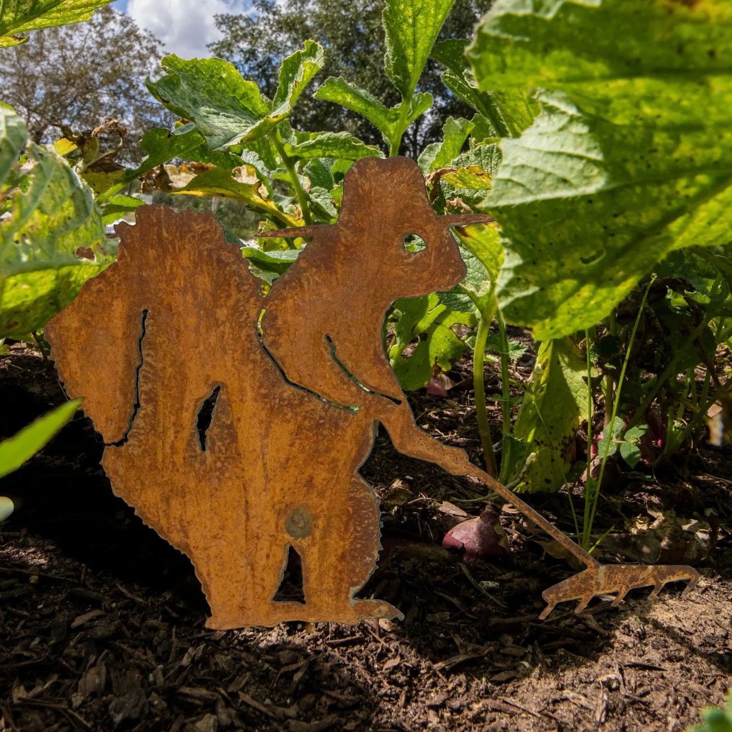 Hard-working squirrel metal art