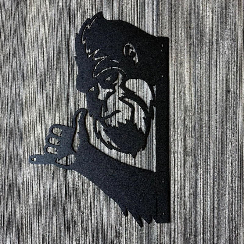 Bigfoot making Shaka hand sign metal art