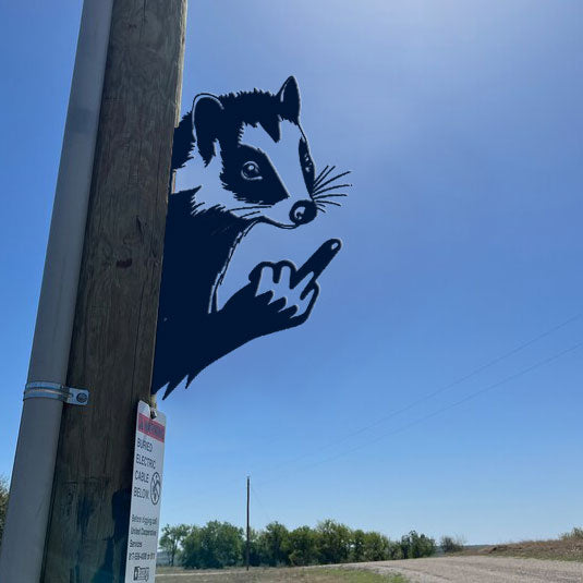 Animal metal art showing middle finger