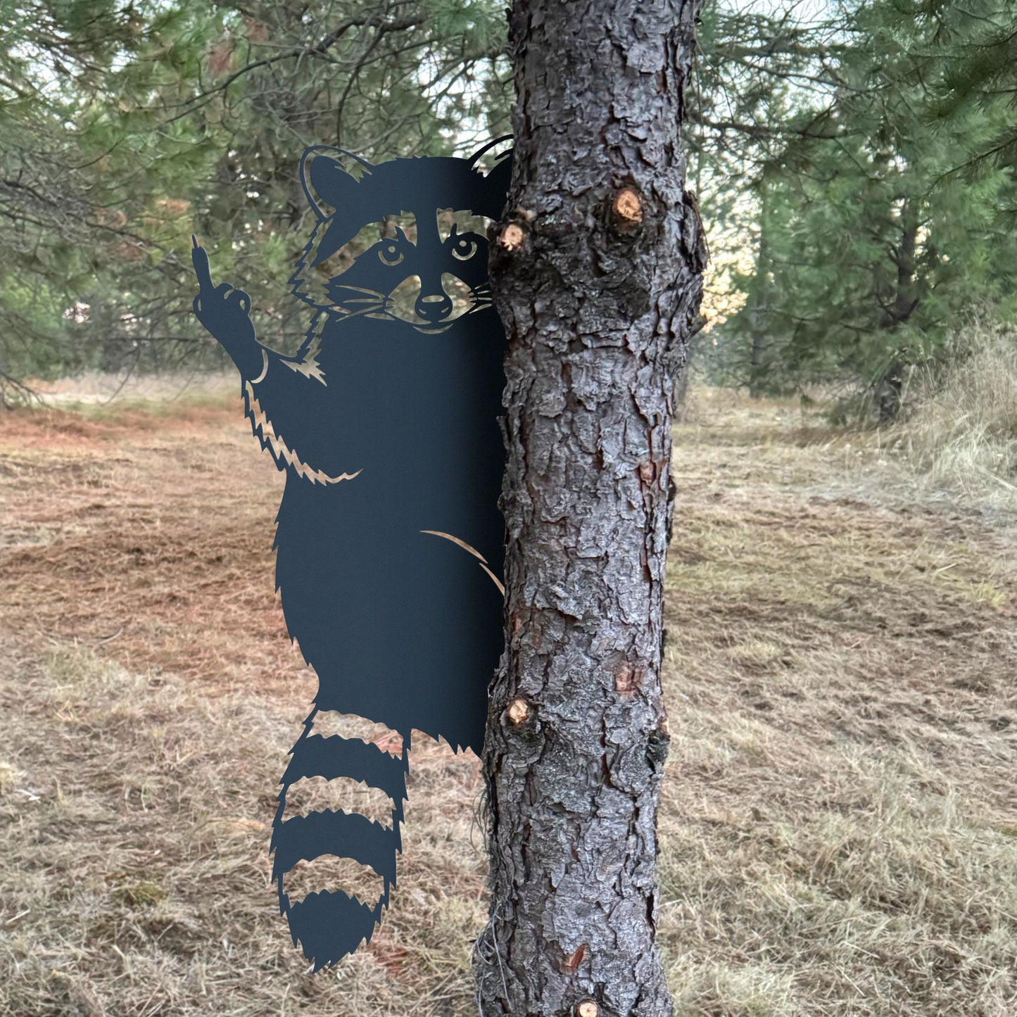 Raccoon giving the middle finger metal art
