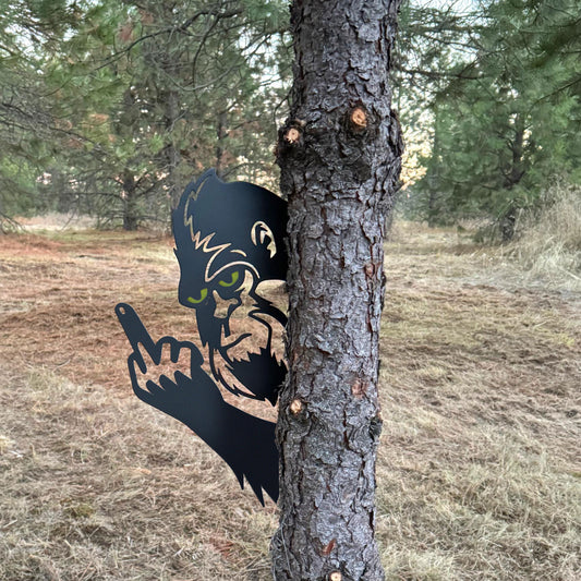 Bigfoot with glowing eyes, giving the middle finger metal art