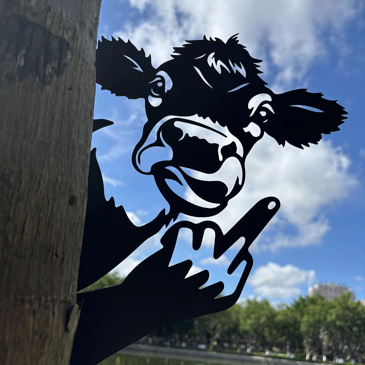 Animal metal art showing middle finger