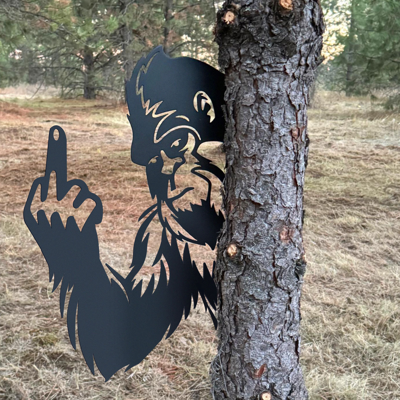 Bigfoot metal art showing middle finger