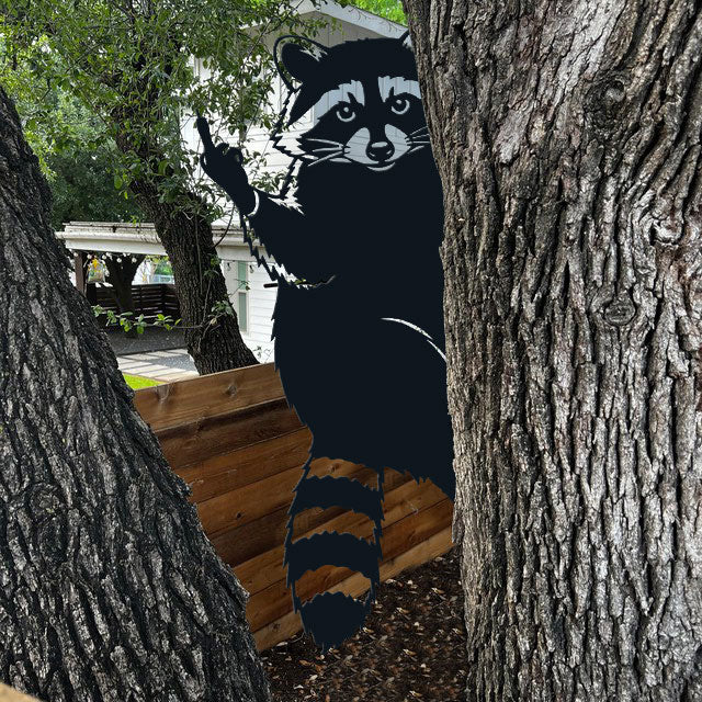 Raccoon giving the middle finger metal art