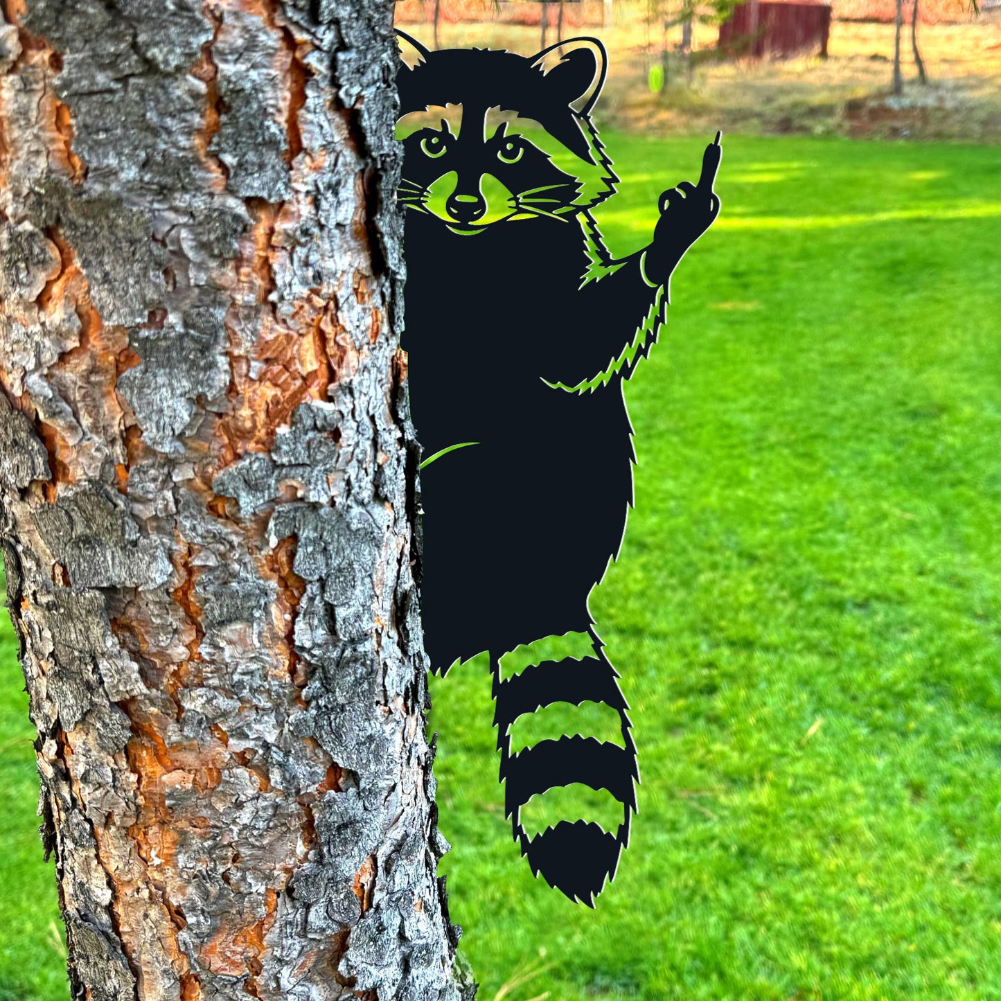 Raccoon giving the middle finger metal art