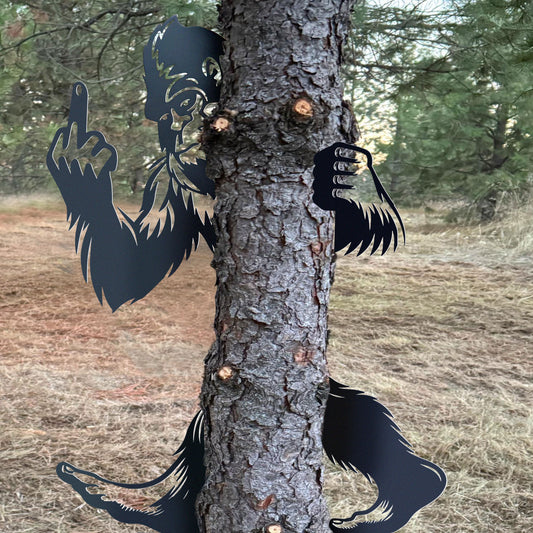 Metal Bigfoot giving the middle finger