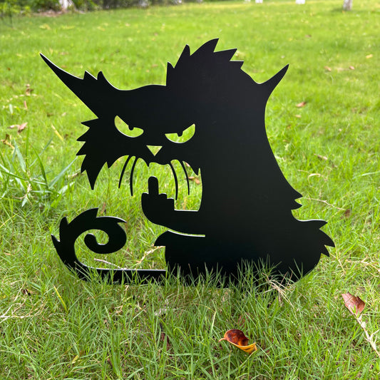 Metal art of a grumpy black cat giving the middle finger