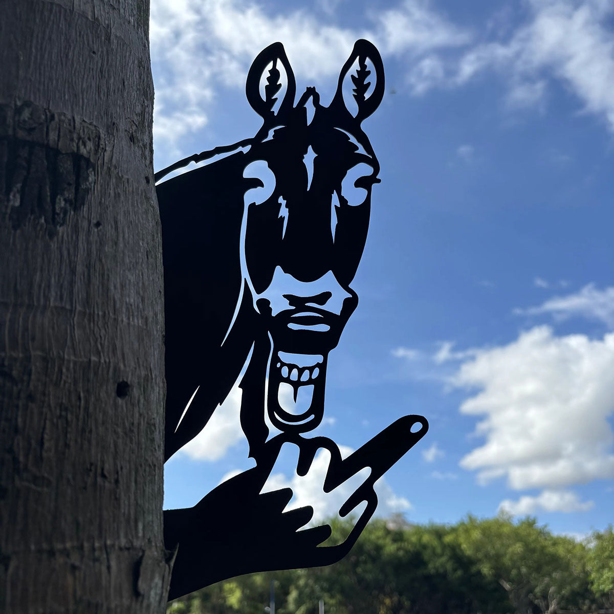 Animal metal art showing middle finger