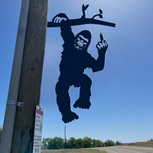 Bigfoot middle finger metal art