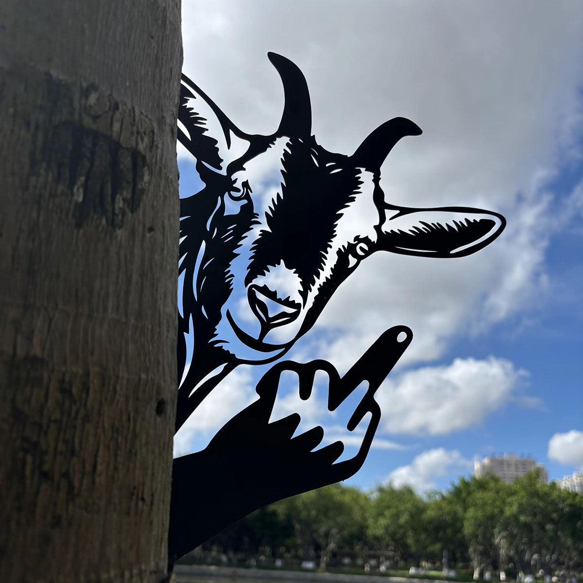 Animal metal art showing middle finger