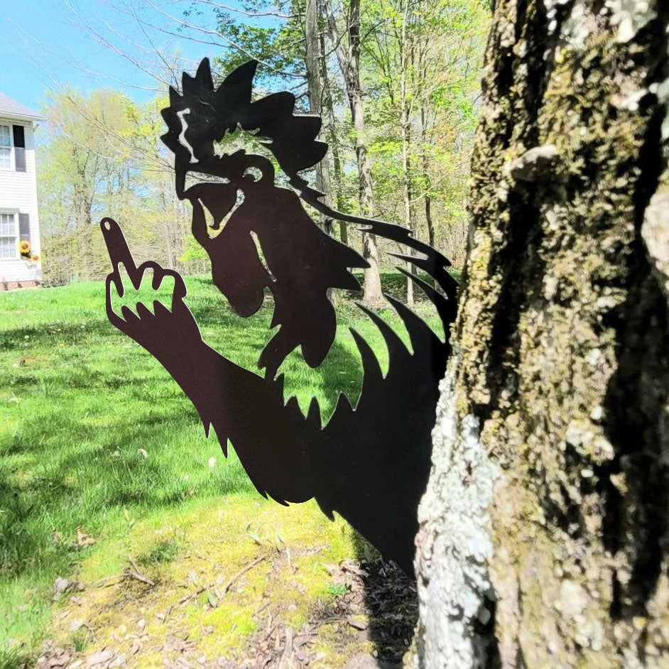 Animal metal art showing middle finger