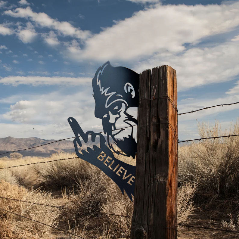 Bigfoot metal art showing middle finger