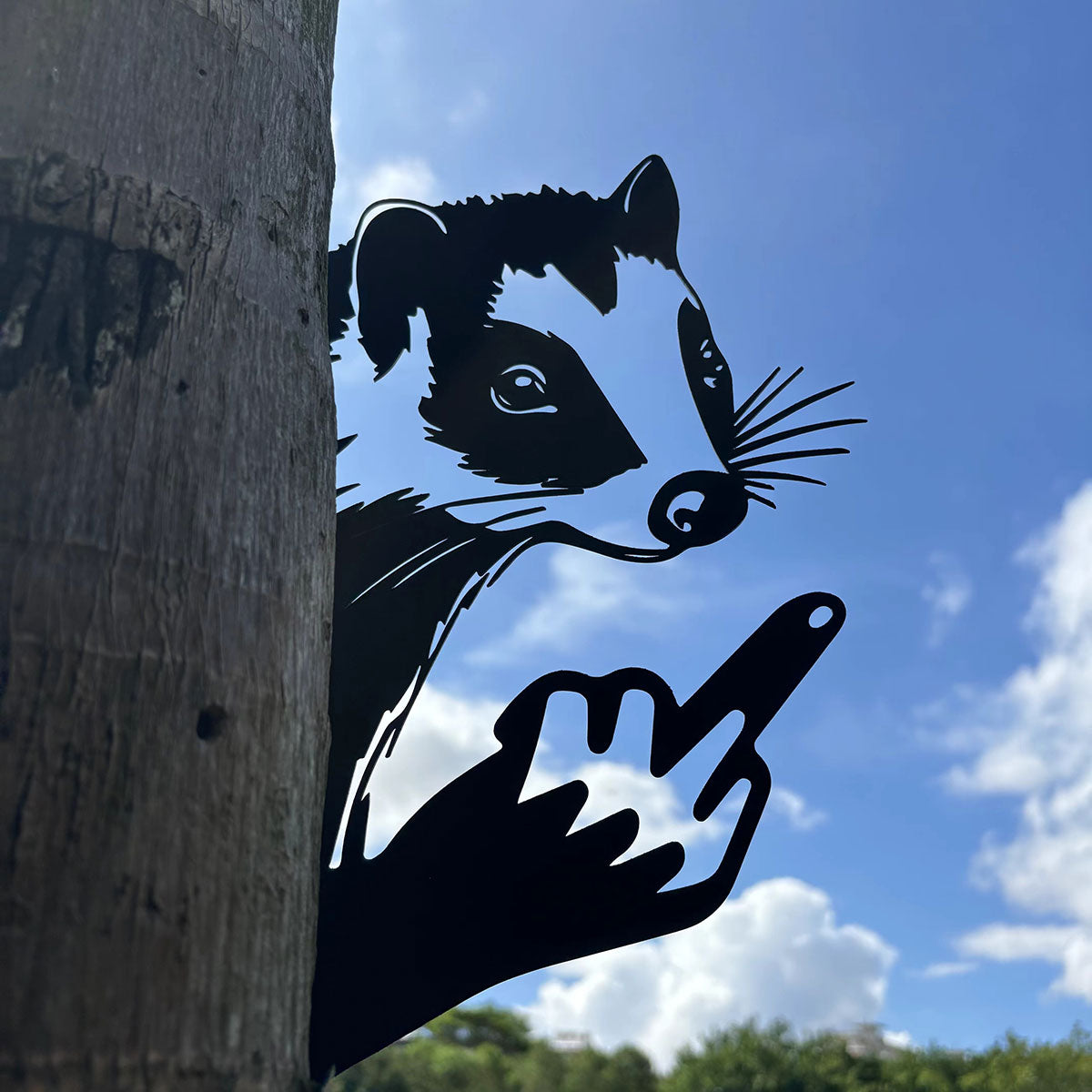 Animal metal art showing middle finger