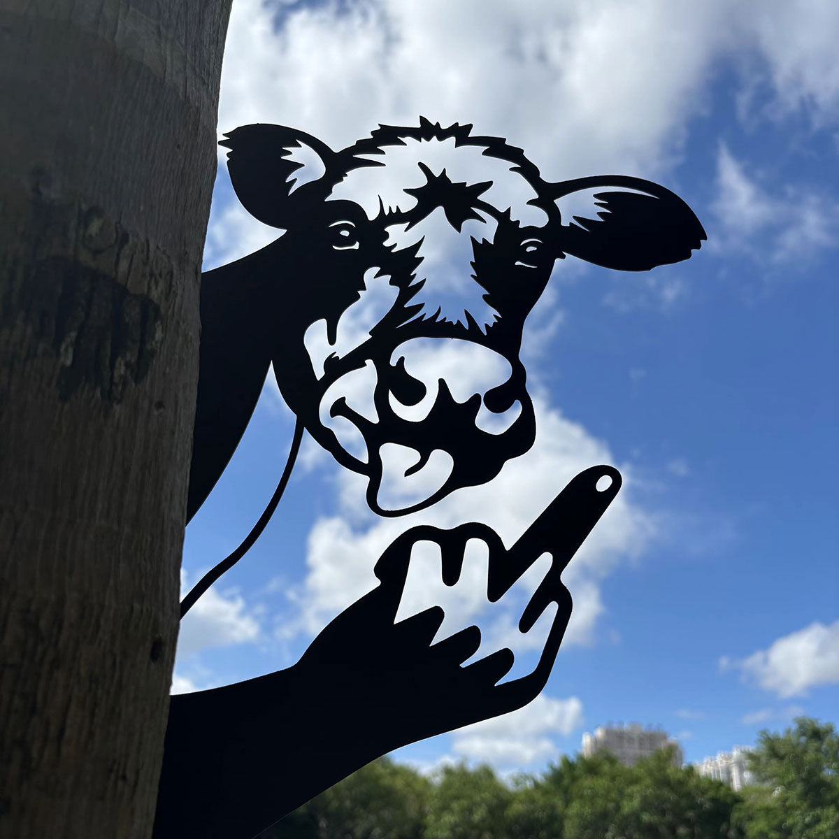 Animal metal art showing middle finger